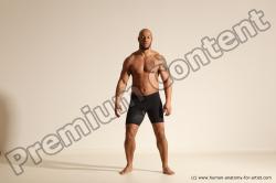 Underwear Gymnastic poses Man Black Muscular Bald Dancing Dynamic poses Academic